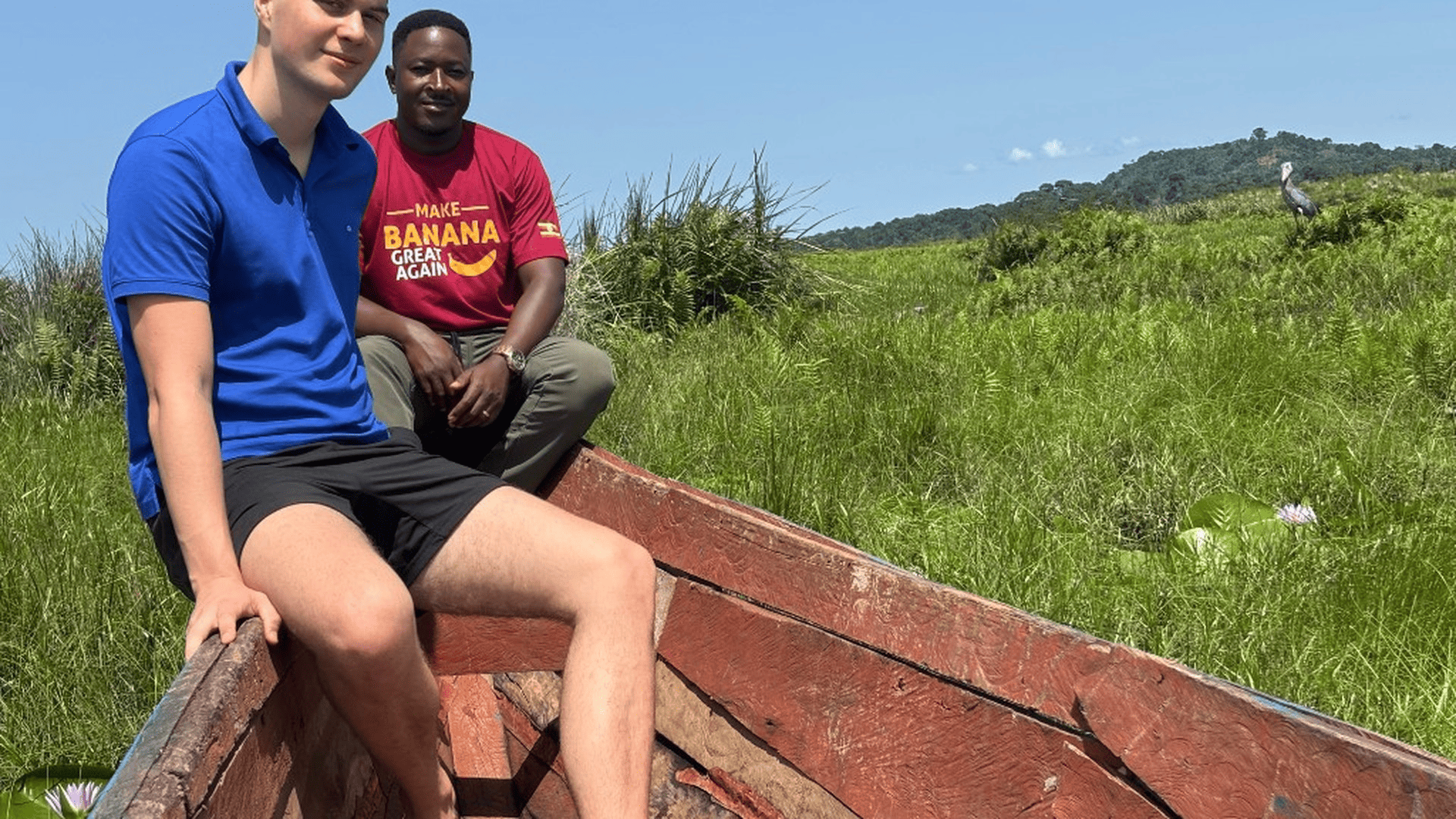 Student and Mwanzo guide on a shoebill stork boat safari during a conservation field module